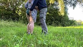 Sexy milf takes off her panties and jerks me off in nature