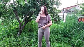 outdoor milf in tight jeans soaks her shaved mature pussy with golden shower in public garden
