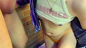 Chained to the wall and on her knees ready to suck