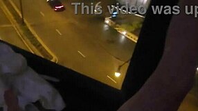 petite wife touches herself by the hotel window