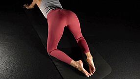 Flexible babe bends over showing off her ass and feet in tight yoga poses
