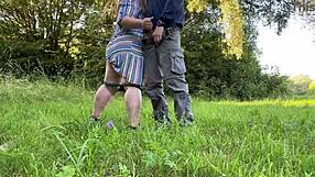 Sexy milf takes off her panties and jerks me off in nature