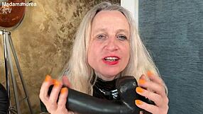In a latex corset horny prolapse fisting with a mega dildo