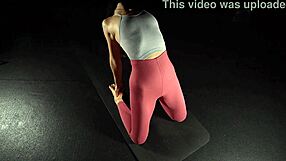 Flexible babe bends over showing off her ass and feet in tight yoga poses
