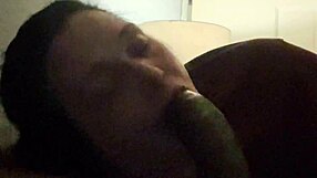 Brunette milf gives deep blowjob to big black cock