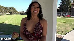 Mia li shows off her bushy pussy in some upskirt action outside