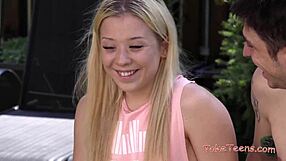teen couple starting in the garden
