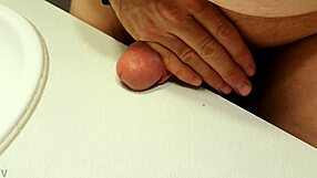 Chubby guy washes his cock outside