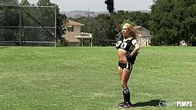 Busty cheerleader honey blossom teases quarterback with shaved look