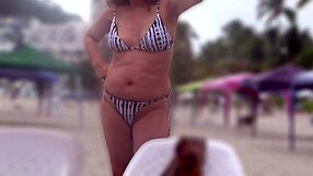 my stepson films me putting on a bikini and masturbating on the beach