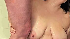 Milf gets pissed on big preggo tits