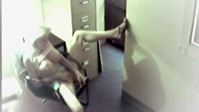 Busty office slut toys her pussy