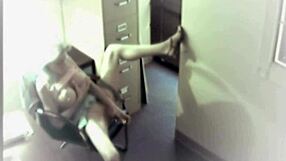 Busty office slut toys her pussy