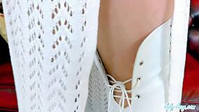 Lady lucy poses in white thigh boots?