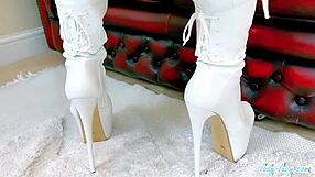 Lady lucy poses in white thigh boots?