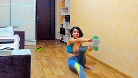 dildo titfuck and pussy fondling during gymnastics with boobs out