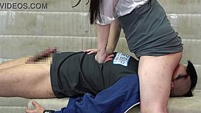 japanese female teacher gives a masochistic man a facesitting and handjob in the gym storage closet
