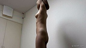 naked japanese gal wears sexy sweater on webcam